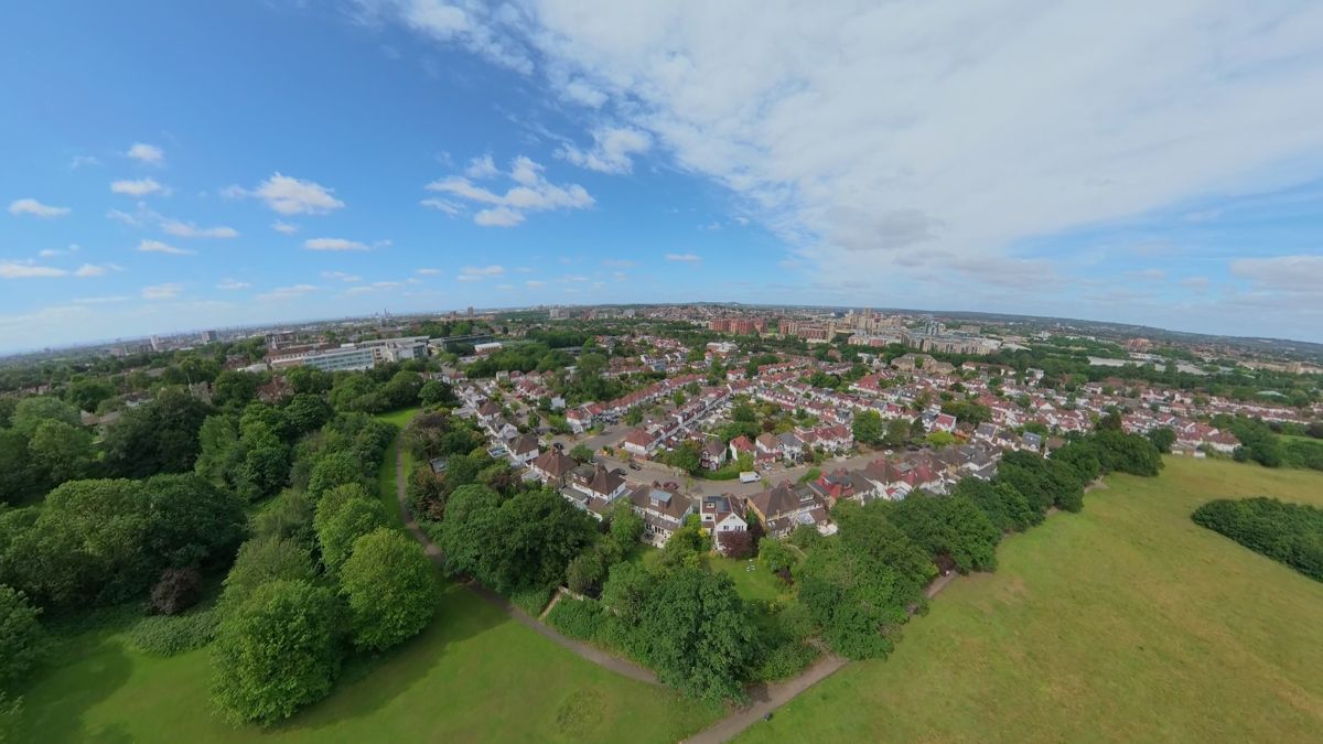 Wide aerial reframed from DJI Avata 360 footage over suburban London