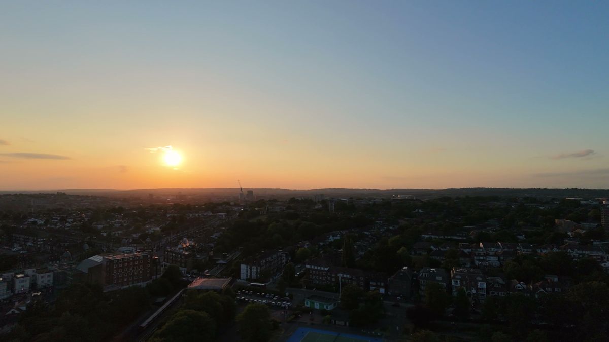 Sunset aerial over London rooftops filmed on the DJI Neo 2