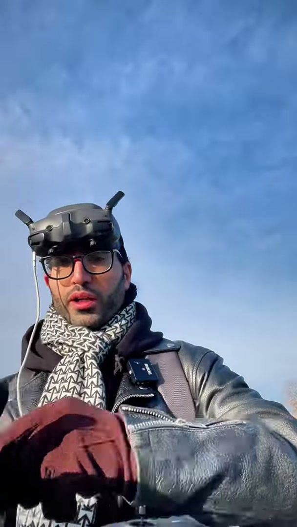 Pilot wearing FPV goggles during an Avata 2 and Neo test flight