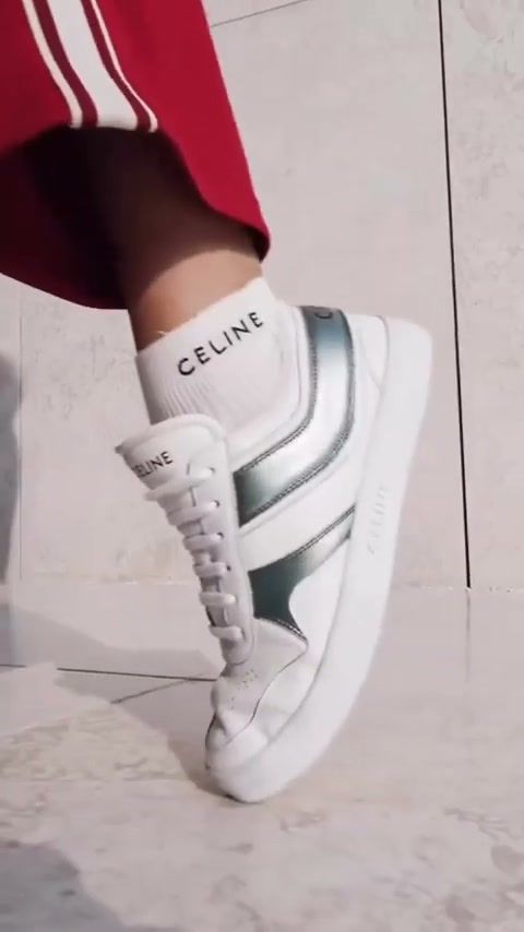 Detail of a Celine trainer and sock
