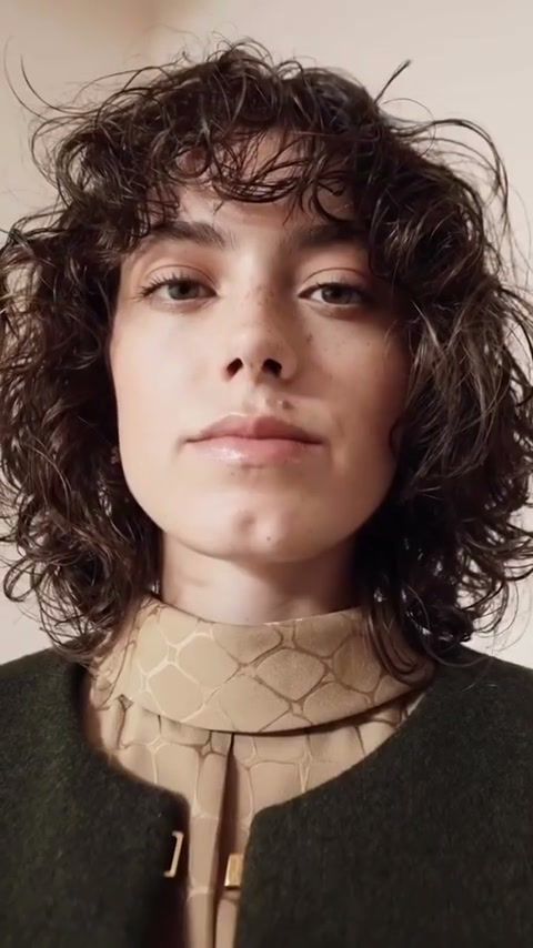 Portrait of the model in Celine Winter 22, soft even light