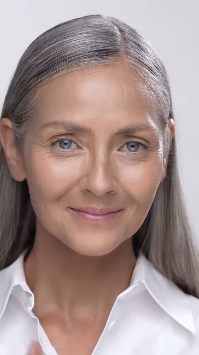 Model with grey hair in a white shirt on a white background, Code8 Day to Night Foundation film