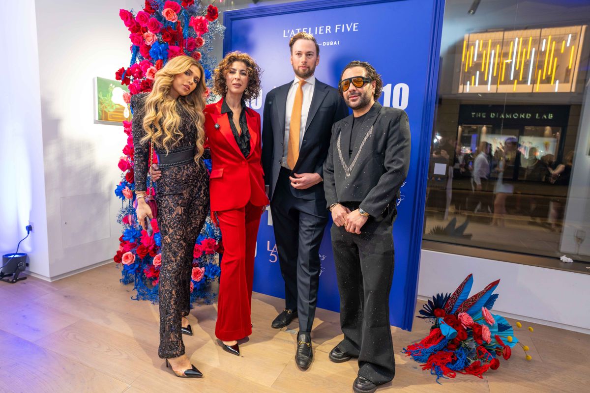 Group portrait at the L'Atelier Five launch backdrop, Opera Gallery London