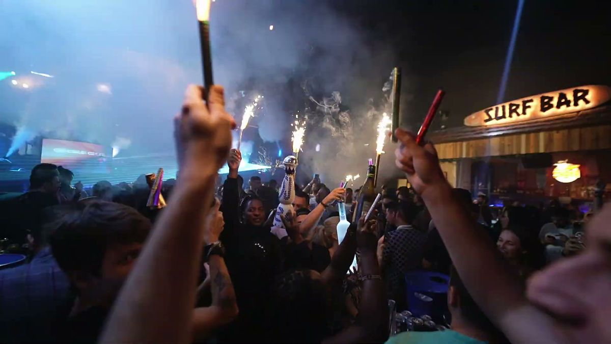 Guests with sparklers at the Shinz closing party in Dubai