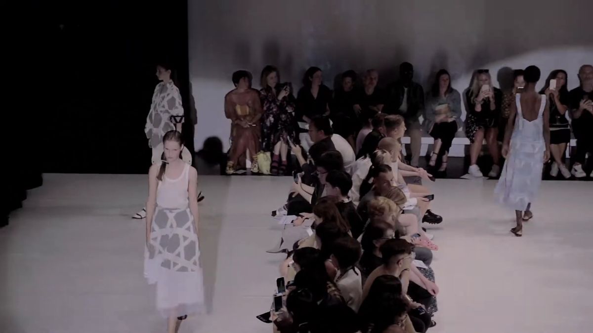 Models walking the Chalayan runway past the front row, London Fashion Week SS20