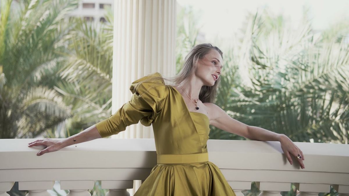 Damas Jewellery campaign, model in a gold gown on a palace terrace in Dubai