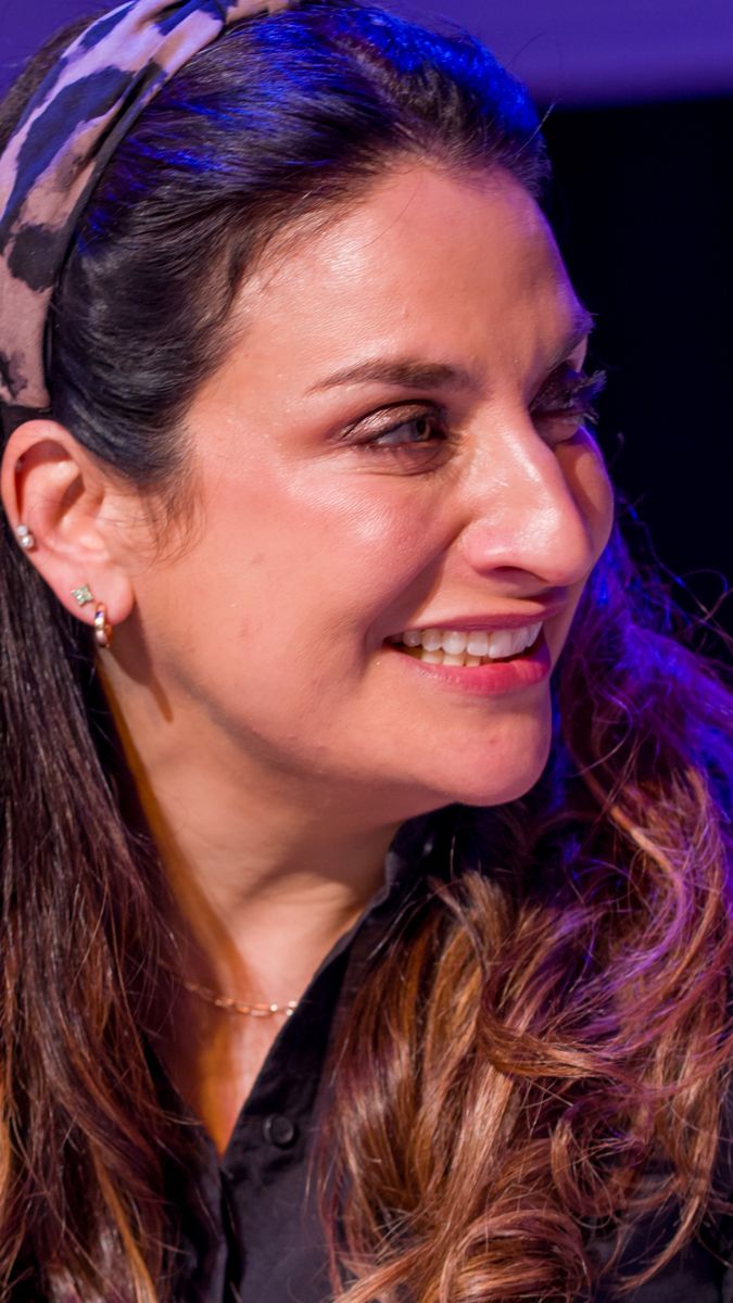 Panellist laughing during the KEN Talks panel discussion