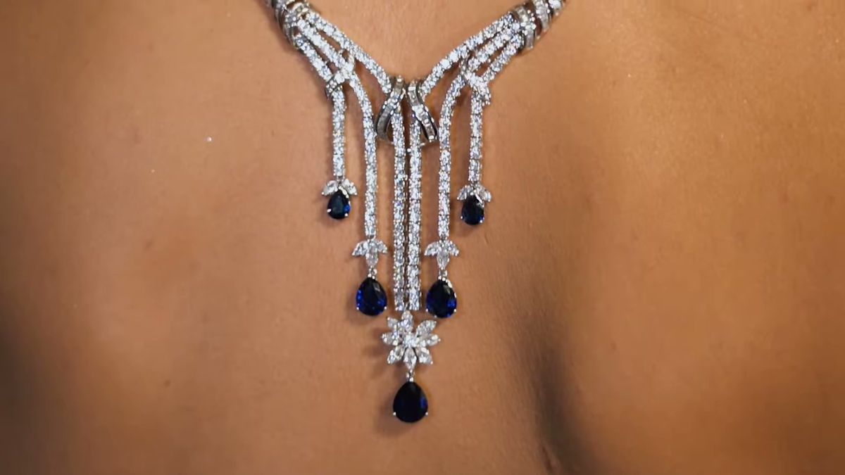 Sapphire and diamond necklace worn on the back in the L'Officiel Baltic film at Palazzo Versace Dubai