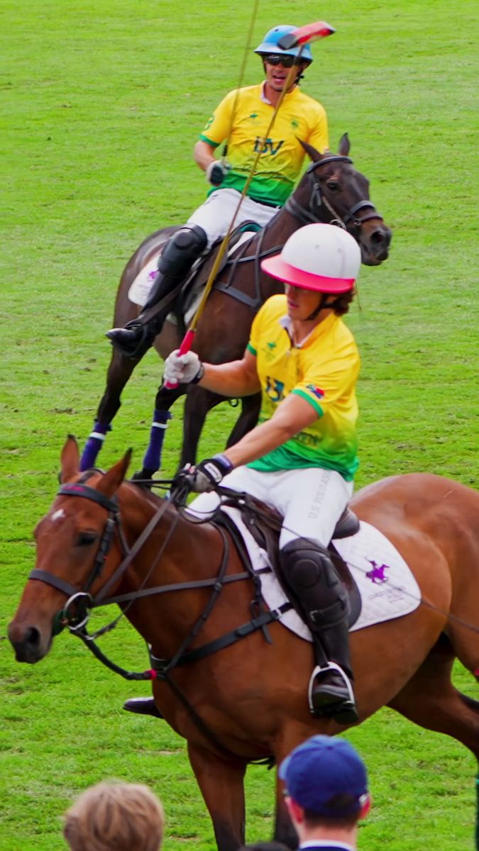 IBV Gold Team Cape Town players riding in a match, vertical frame