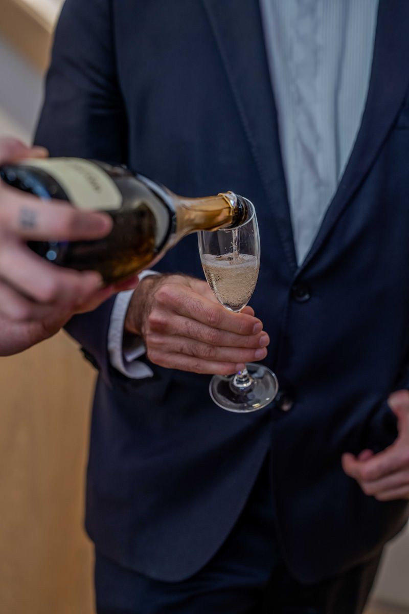 Champagne being poured at the launch