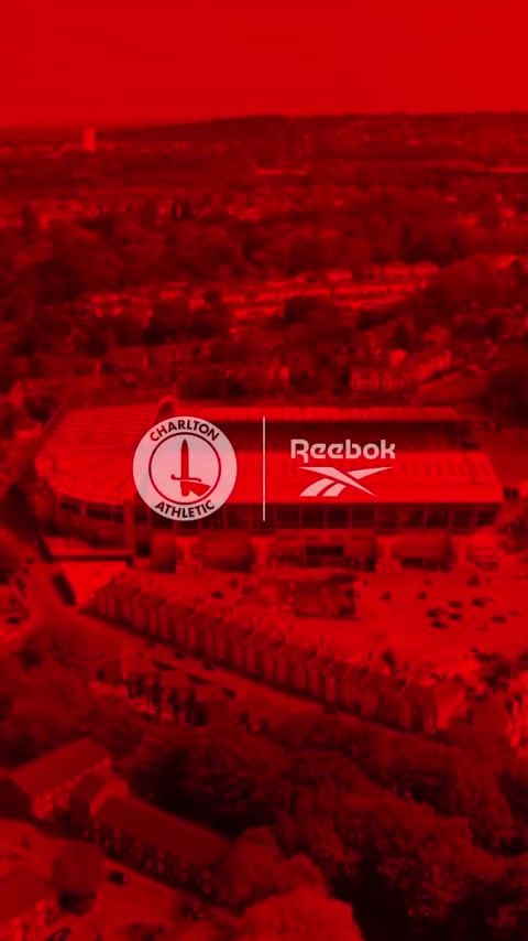 Red-graded stadium aerial with the Charlton Athletic and Reebok logo lockup