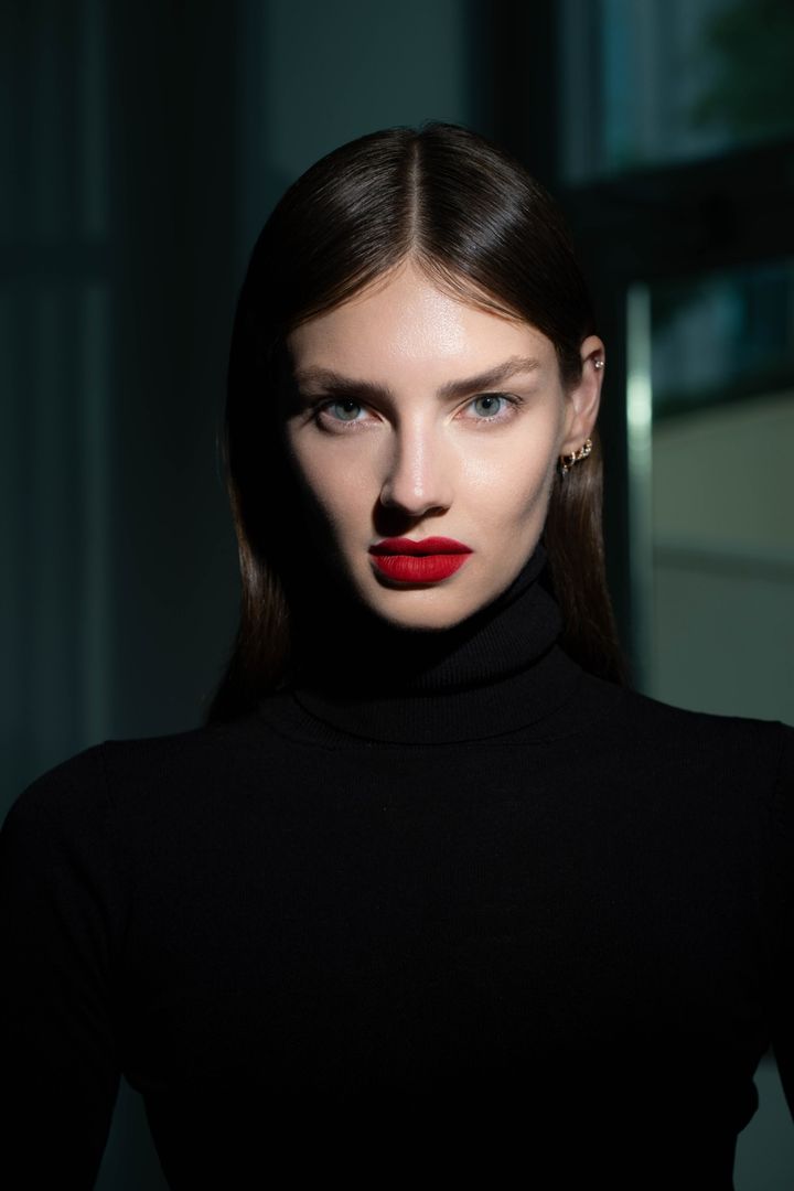 Low-key beauty portrait, one light and one red lip